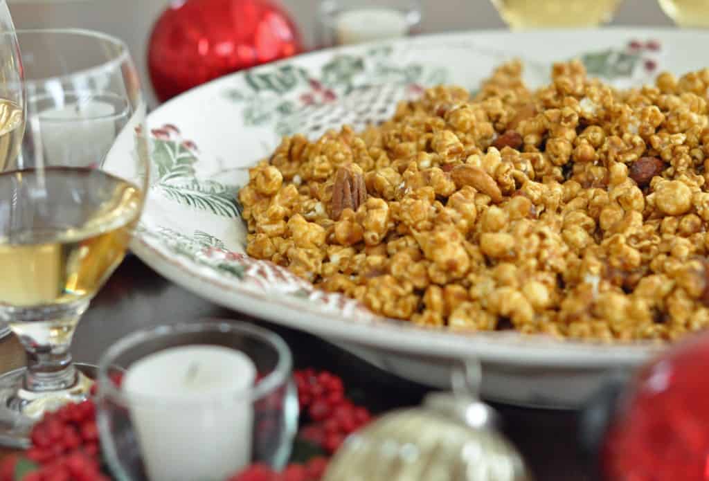 This is the Best Caramel Corn ever!   This homemade caramel corn is perfect for holiday parties or wrap in cellophane bags with ribbons and give as gifts