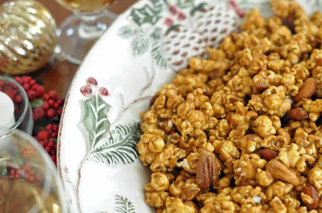 This is the Best Caramel Corn ever!   This homemade caramel corn is perfect for holiday parties or wrap in cellophane bags with ribbons and give as gifts