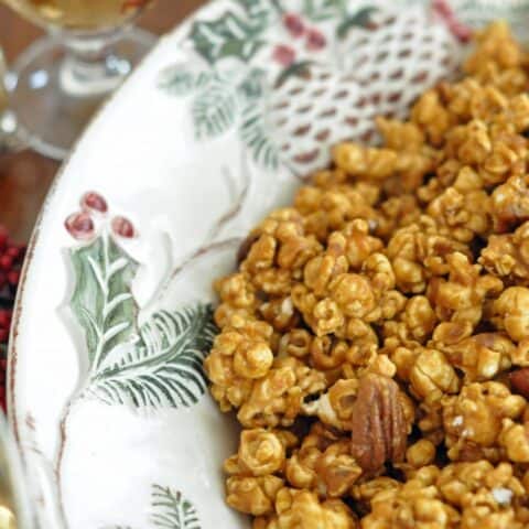 This is the Best Caramel Corn ever!   This homemade caramel corn is perfect for holiday parties or wrap in cellophane bags with ribbons and give as gifts