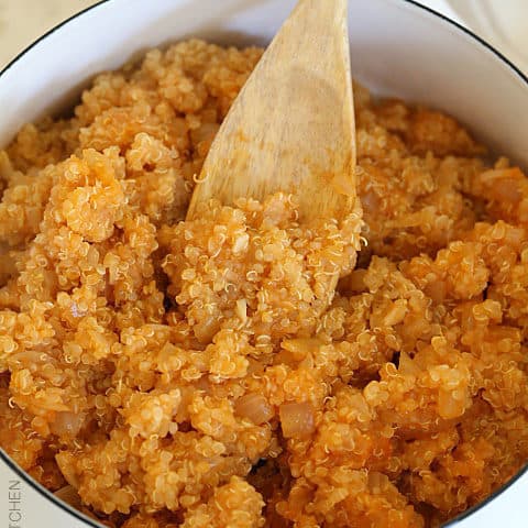 A white pot of cooked Spanish quinoa.