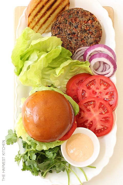 Moist and tender Quinoa Black Bean Burgers made with black beans, quinoa, vegetables all topped with a chipotle mayonnaise