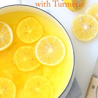 Pot with lemon ginger detox drink