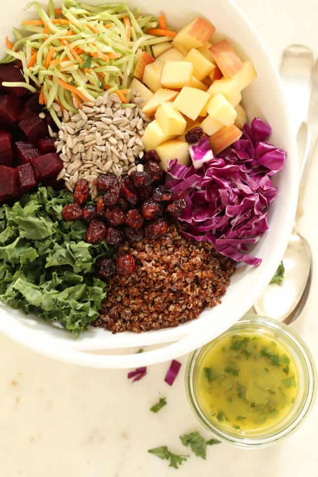 A white bowl of superfoods salad ingredients.