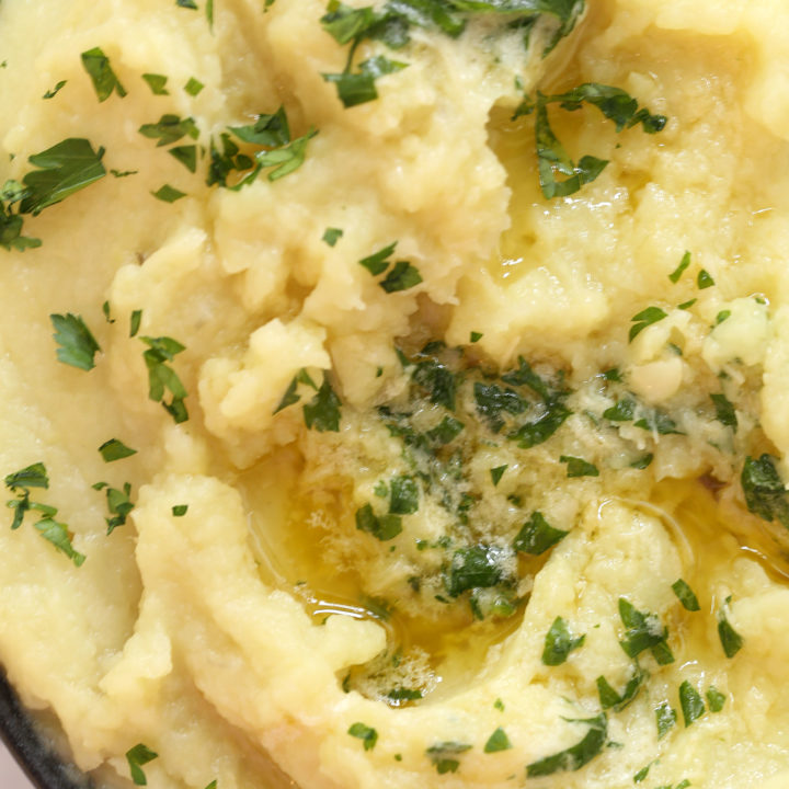 Mashed Sweet Potatoes with Roasted Garlic Parsley Butter is super easy to make and it makes the best side dish for roasted chicken or fish