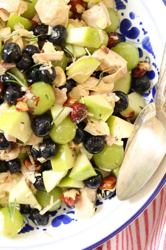 This Blueberry Chicken Salad is loaded with chopped chicken, blueberries, grapes, apple and hazelnuts all tossed in a delicious rosemary lime vinaigrette