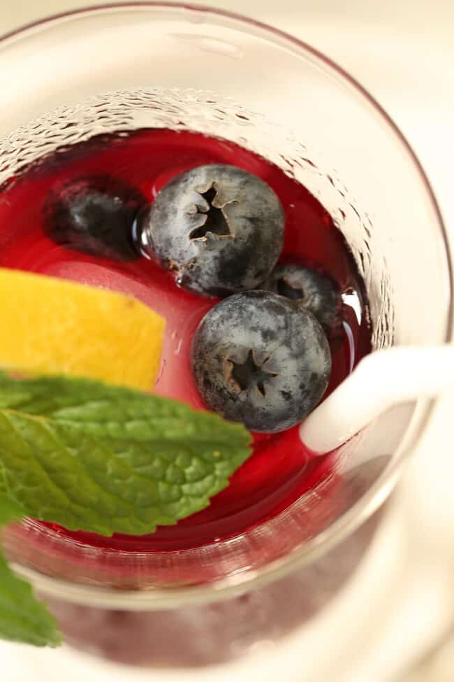 glass filled with immunity booster drink made of blueberries 