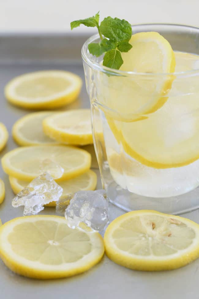 Add these Alkalizing Frozen Lemon Slices to water or herbal or green tea for added alkalizing, detoxifying and other nutritional benefits.   