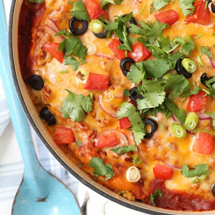 This Easy Turkey Enchilada Casserole is loaded with ground turkey, corn, pinto beans, tortillas and an easy homemade enchilada sauce