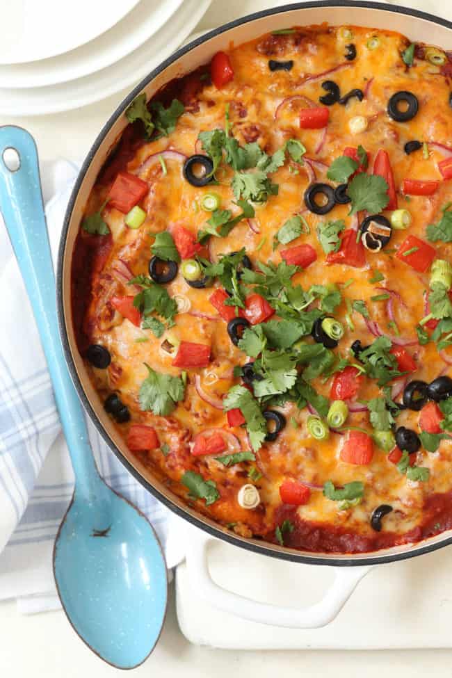 This Easy Turkey Enchilada Casserole is loaded with ground turkey, corn, pinto beans, tortillas and an easy homemade enchilada sauce