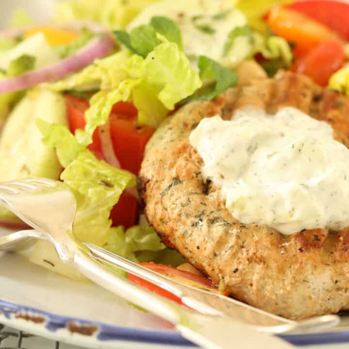 plate of salad with grilled turkey patties