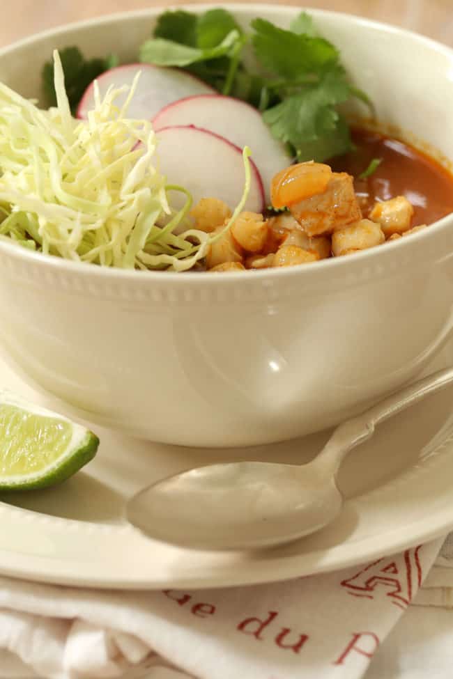 This Mexican Chicken Posole is a  richly flavored soup made with hominy, garlic, onion,  cilantro and chicken