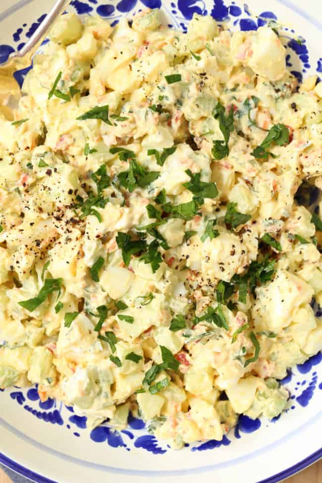 A white bowl filled with low fat egg salad.
