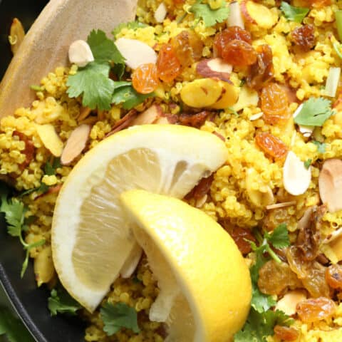A white skillet filled with Lemon Quinoa.