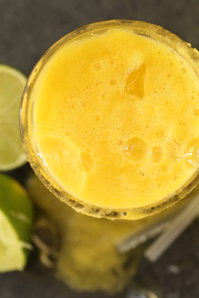 glass of detox juice made of pineapple and ginger