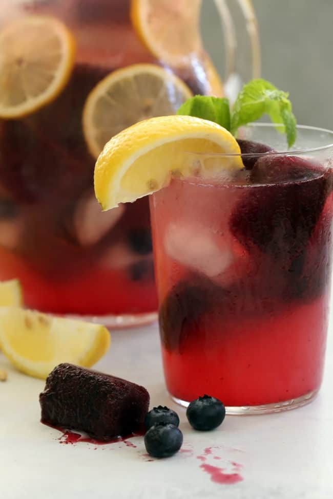 Blueberry Lemonade is a blend of freshly squeezed lemon juice, fresh blueberries, raw honey and water to make a delicious summer drink