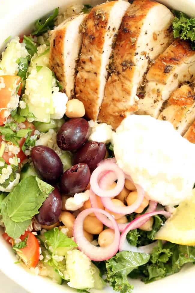 bowl of grilled chicken and salad