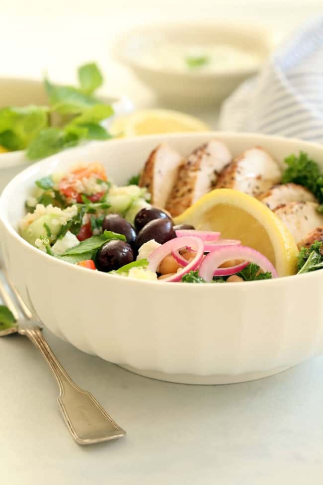 bowl of grilled chicken and salad