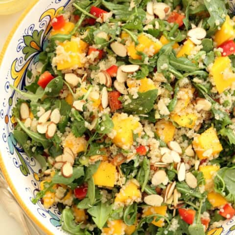 bowl of arugula quinoa salad