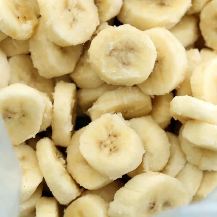 A freezer bag filled with frozen banana slices.