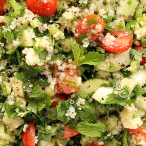 This Crunchy Quinoa Tabbouleh Salad features fresh parsley, mint, green onion, cherry tomatoes, cucumber, and a bit of apple