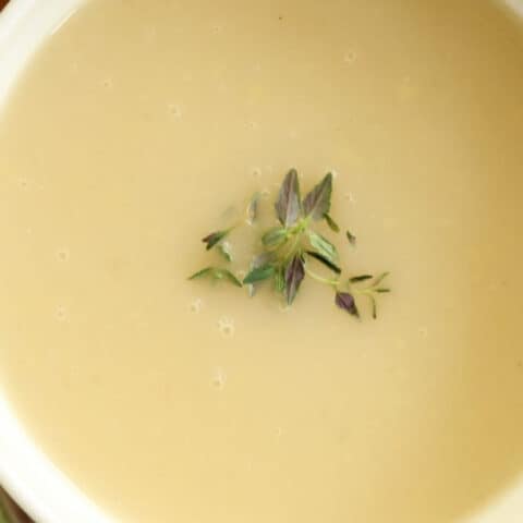 This Dairy Free Creamy Onion Soup is a vegan onion soup made with sweet onions, fresh ginger, vegetable broth, thyme and marsala wine