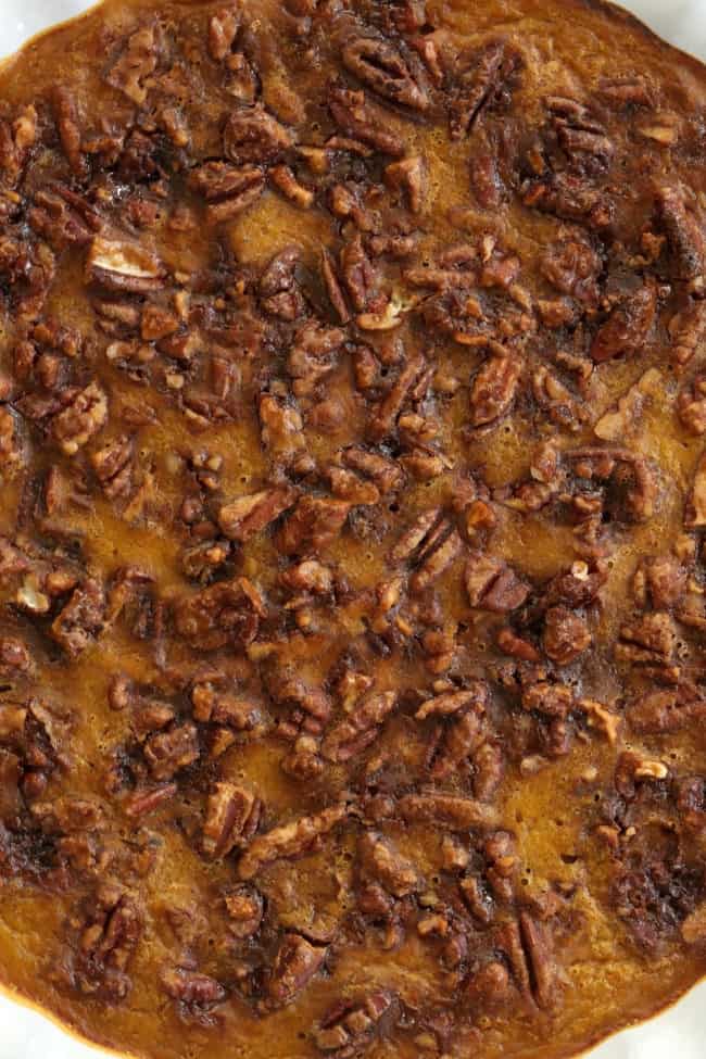 A white dish filled with Vegan Pumpkin Pudding.