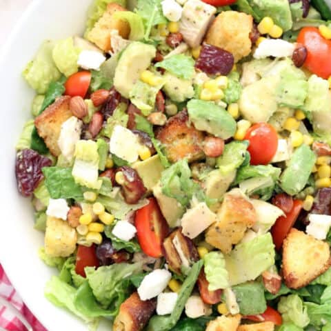 white bowl filled with avocado chicken salad