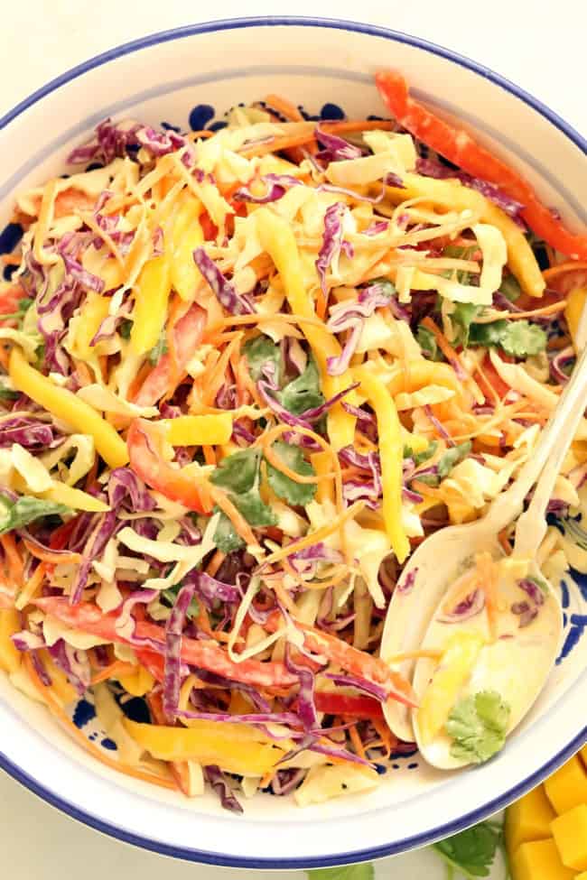 A bowl of healthy coleslaw with citrus dressing.