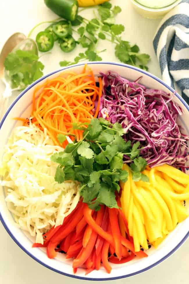 A white bowl of vegetables.