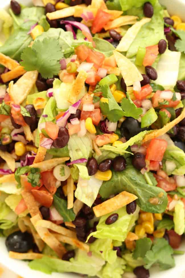 tossed Mexican salad with corn in a bowl