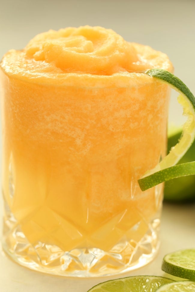 This Cantaloupe Lime Slush is made with frozen cantaloupe chunks, fresh lime, and coconut water and makes a delicious healthy snack or dessert