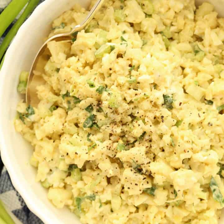 This Low Carb Cauliflower Potato Salad is loaded with eggs, onions and celery and the dressing is the typical mayonnaise and mustard base