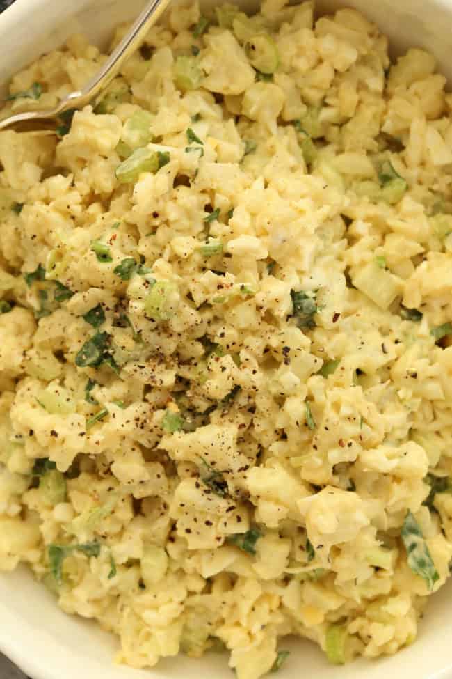 This Low Carb Cauliflower Potato Salad is loaded with eggs, onions and celery and the dressing is the typical mayonnaise and mustard base