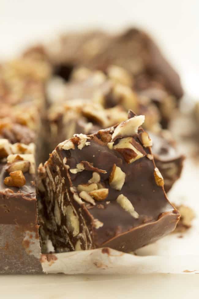 No bake chocolate oat bars on parchment paper. 
