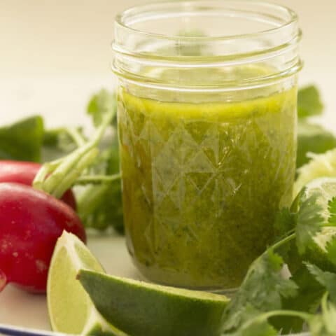 mason jar filled with cilantro lime vinaigrette