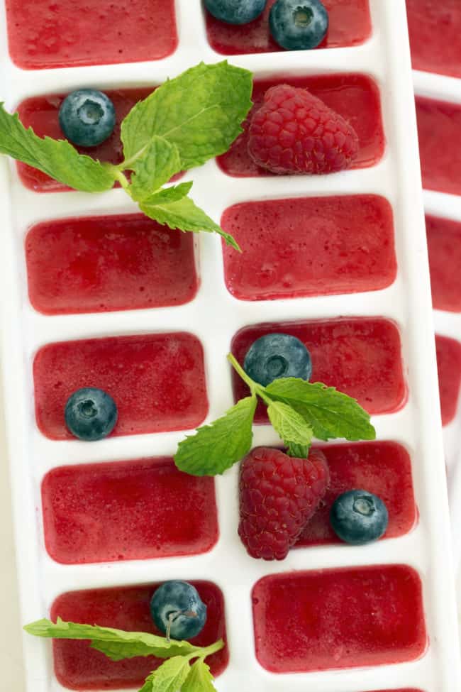 These Summer Berry Ice Cubes are made with fruit puree and add a refreshing pop of flavor and extra antioxidant benefits to a glass of water or tea