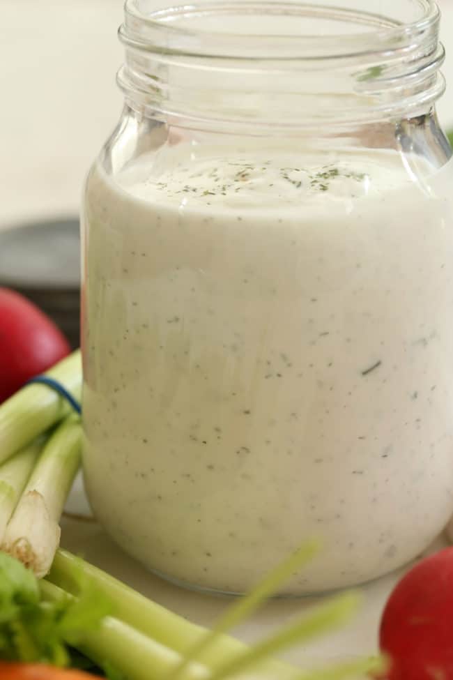 clear mason jar filled with homemade ranch dressing