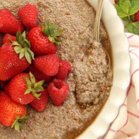 A white dish filled with Chocolate Chia Seed Pudding.