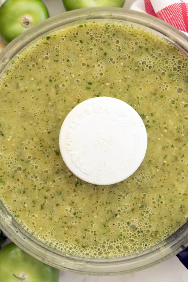 This Easy Homemade Salsa Verde Recipe is made with fresh roasted tomatillos, poblano chili pepepr, onion, garlic and cilantro
