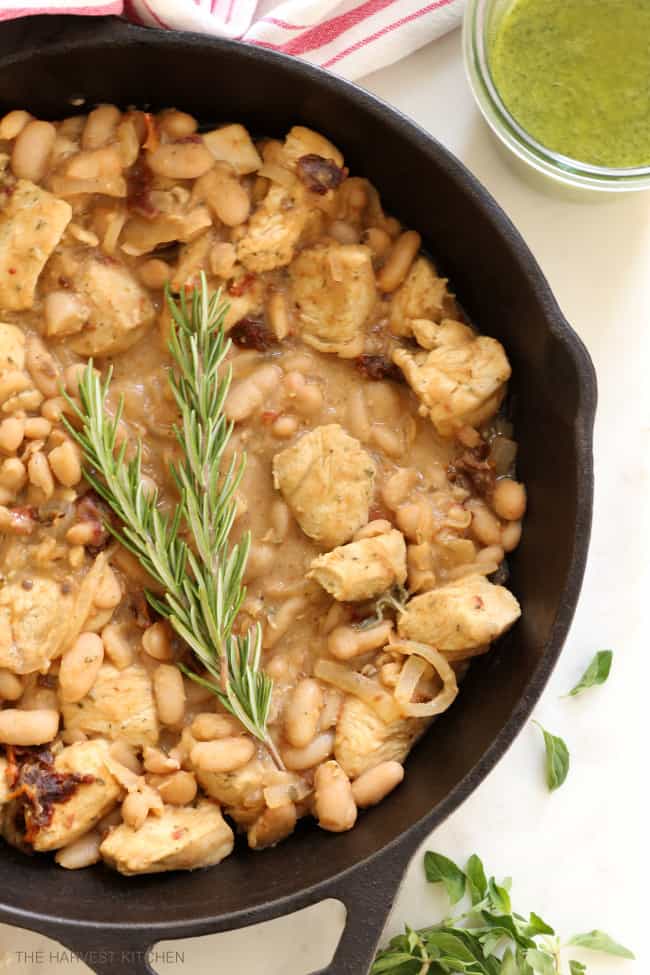 A cast iron skillet filled with stew.