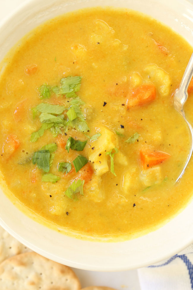 This Turmeric Cauliflower Chowder is loaded with cauliflower, carrots, celery, onion, ginger, turmeric, garlic, cumin and a wee bit of coconut milk