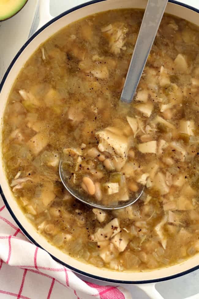 This White Bean Chicken Chili is made with cooked chicken, cannellini beans, canned green chilies, onion garlic and traditional Mexican seasoning