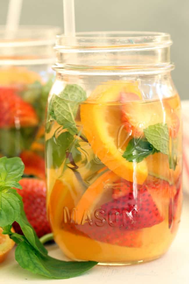 A mason jar filled with turmeric tea.