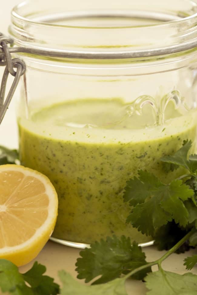 This Cleansing Lemon Herb Vinaigrette is made with fresh parsley and cilantro, lemon juice, garlic, honey, Dijon mustard and olive oil