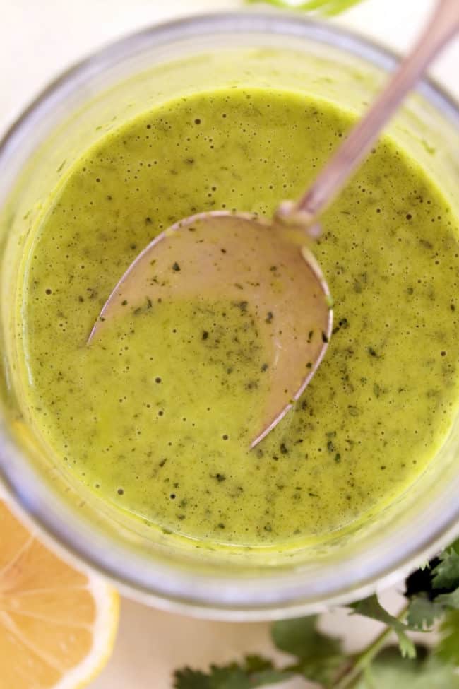 This Cleansing Lemon Herb Vinaigrette is made with fresh parsley and cilantro, lemon juice, garlic, honey, Dijon mustard and olive oil