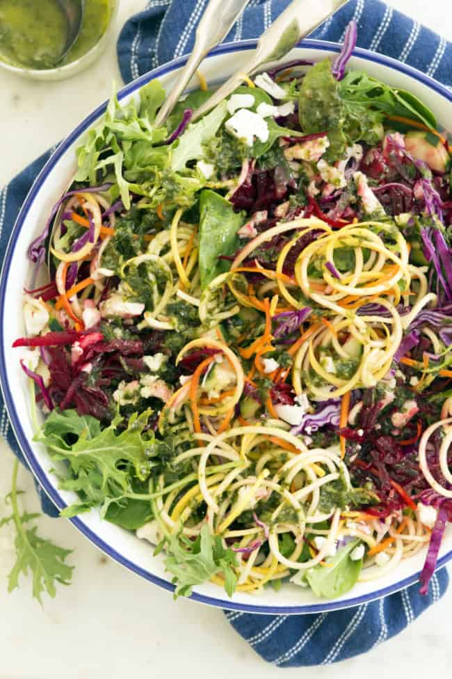 https://www.theharvestkitchen.com/wp-content/uploads/2019/03/rainbow-salad-mixed-dressing-2-650x975.jpg