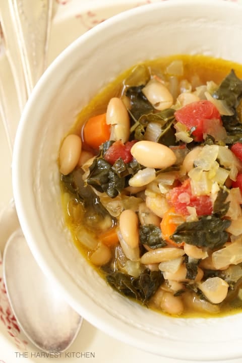 This White Bean Soup with Kale is loaded with onions, carrots, celery, garlic, beans and kale