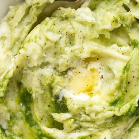These Basil Mashed Potatoes are classic mashed potatoes with a swirl of homemade pesto to makes the best mashed potatoes your whole family will love