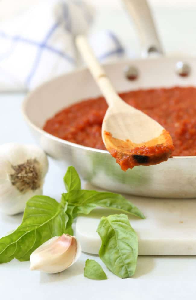 This Classic Marinara Sauce is a quick and easy tomato sauce recipe made with canned tomatoes, herbs and garlic and can be used in a myriad  of ways