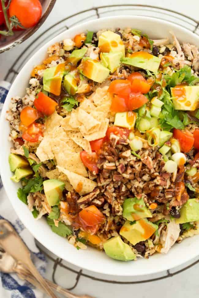 A white bowl of southwest quinoa salad.